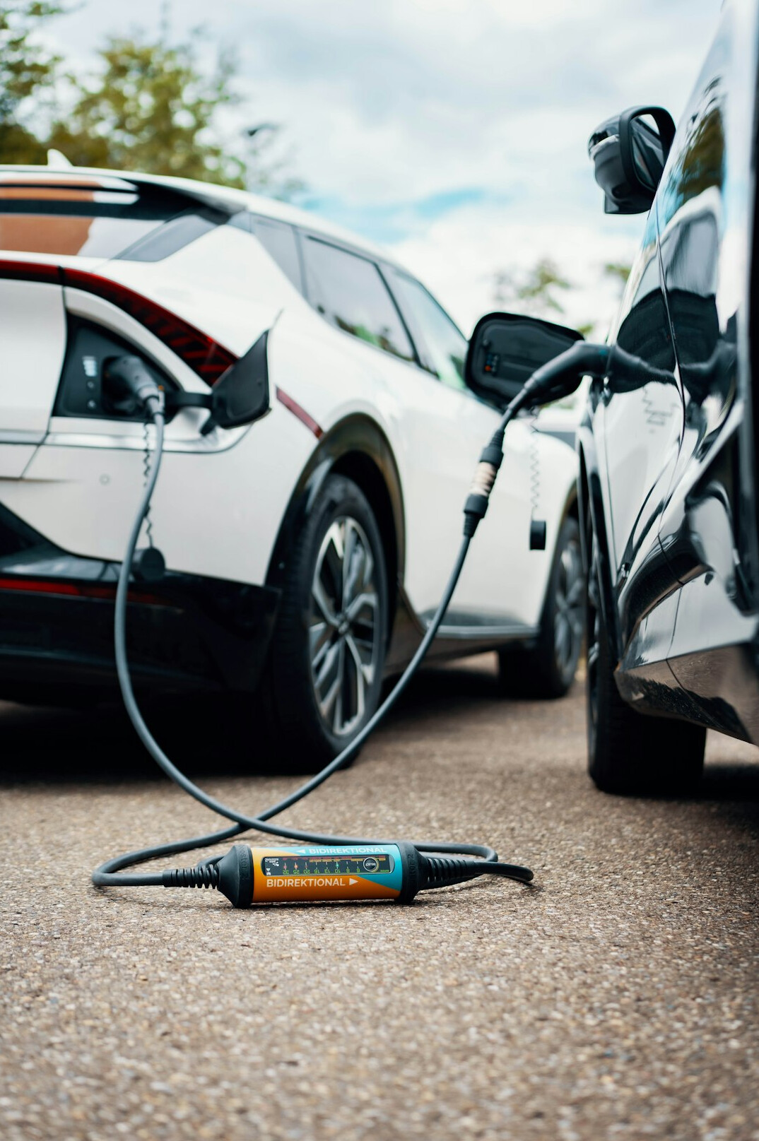 Electric car charging at a charging station